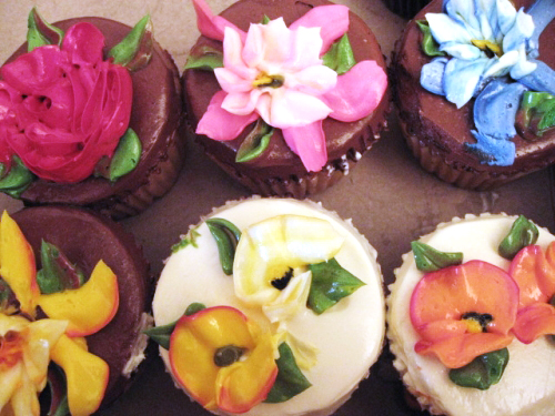 and fresh vegetables and green leafy trees and well pretty cupcakes