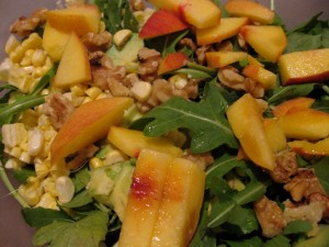 arugula salad with corn, walnuts, avo, peaches
